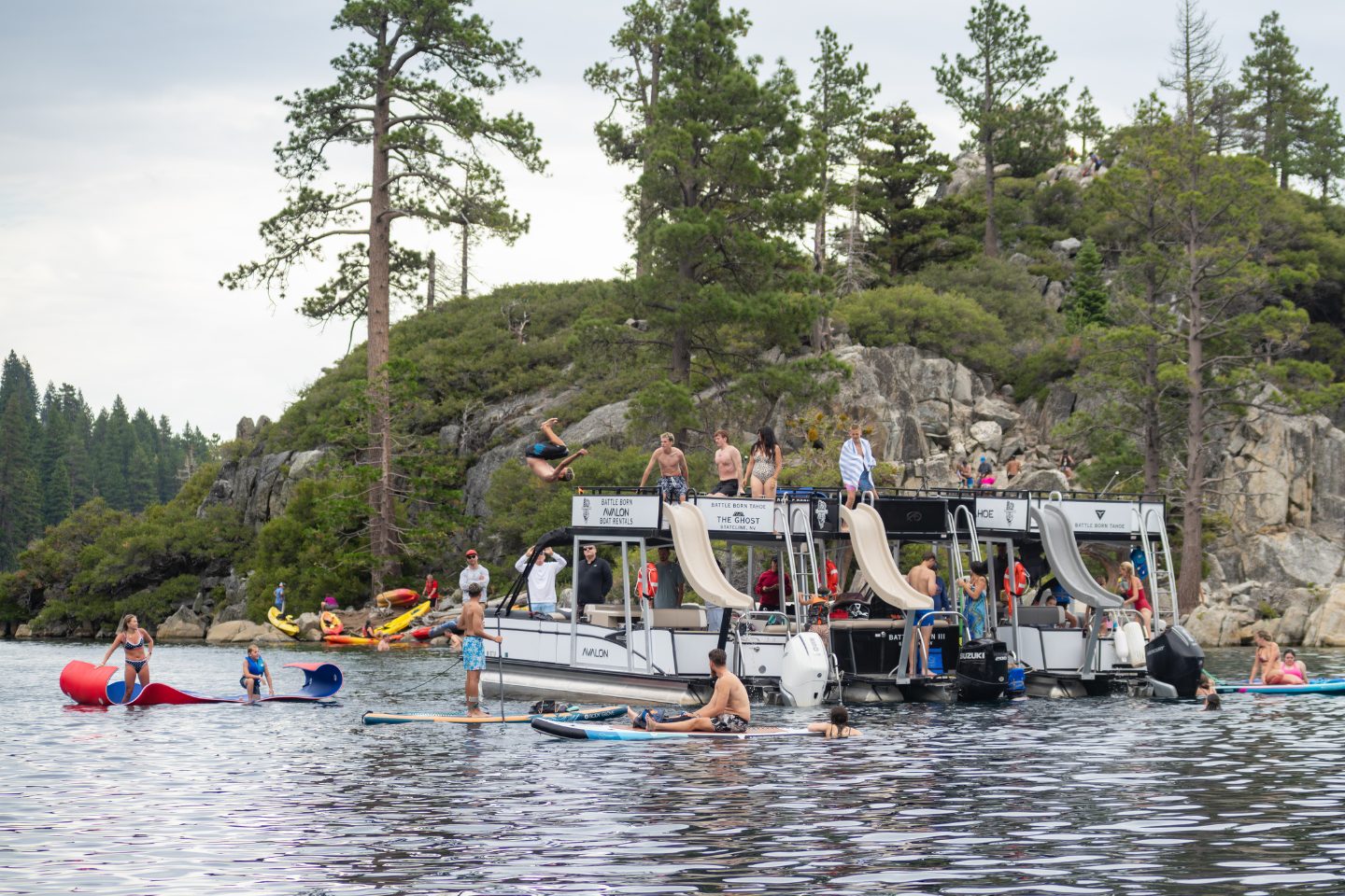 lake tahoe pontoon boat anchors up near island